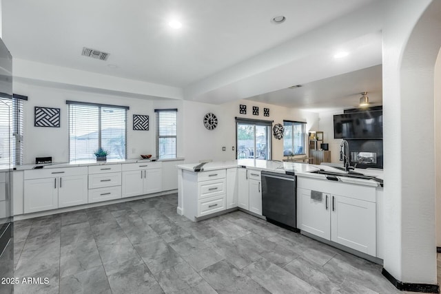 kitchen with visible vents, recessed lighting, white cabinetry, a sink, and dishwasher