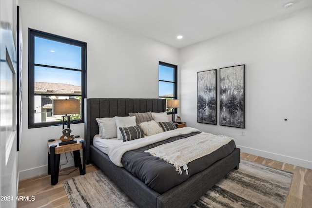 bedroom featuring hardwood / wood-style floors