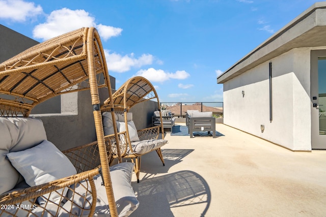 view of patio with outdoor lounge area and a gazebo