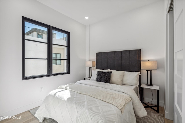 bedroom featuring light wood-type flooring