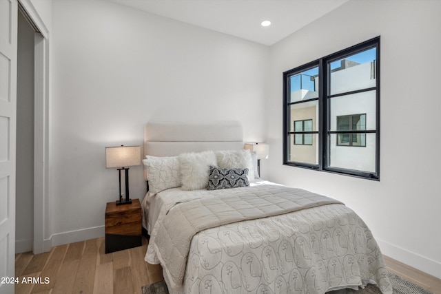 bedroom featuring hardwood / wood-style floors