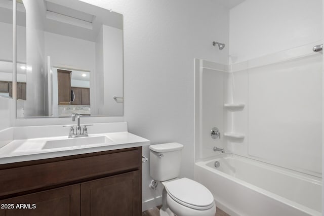 full bathroom featuring vanity, shower / bathtub combination, and toilet