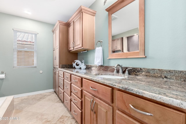 bathroom featuring vanity and tile patterned flooring