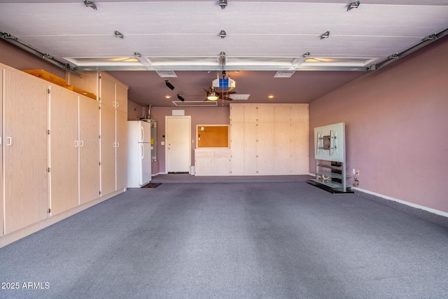 garage featuring a garage door opener and white fridge