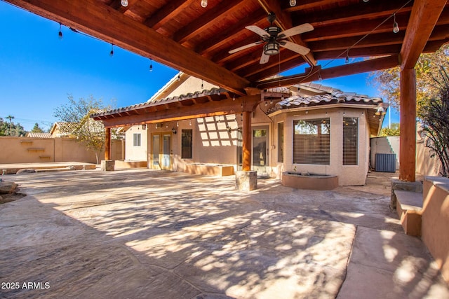 view of patio featuring central AC and ceiling fan