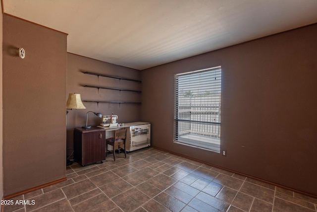 home office with dark tile patterned flooring