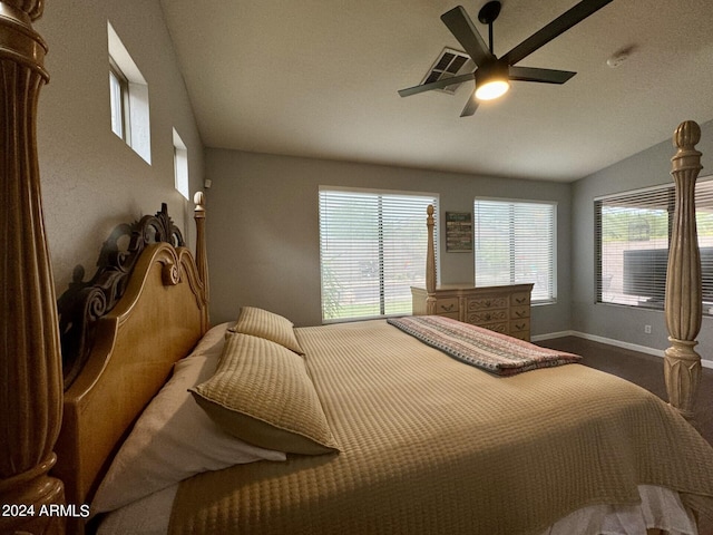 bedroom with vaulted ceiling, ceiling fan, carpet, and baseboards