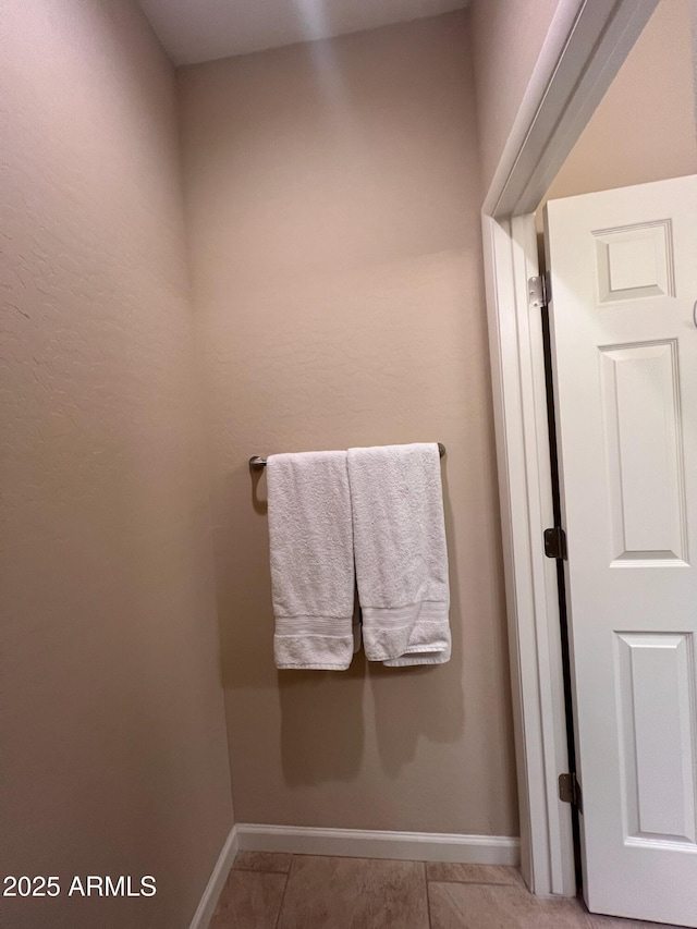 bathroom with tile patterned flooring