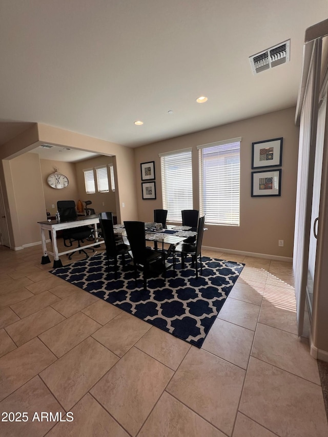 view of tiled dining space