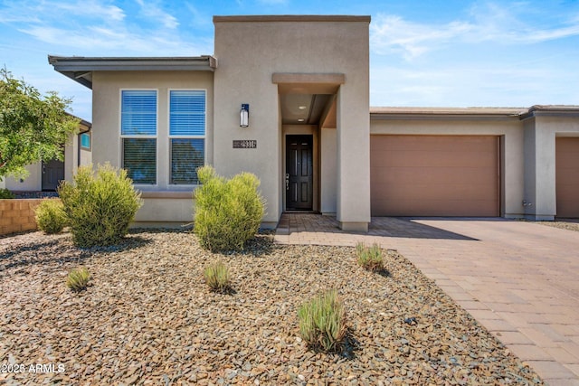 view of front of home featuring a garage