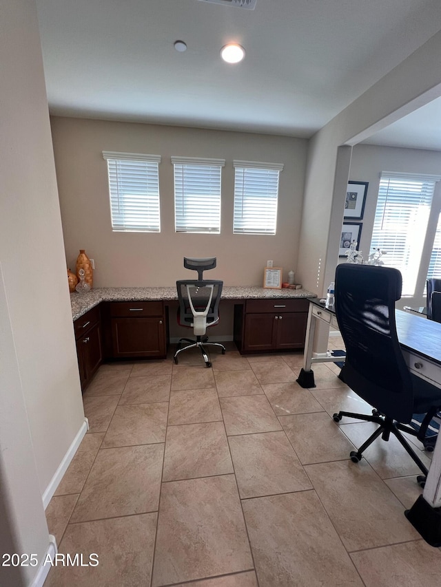 tiled office featuring built in desk