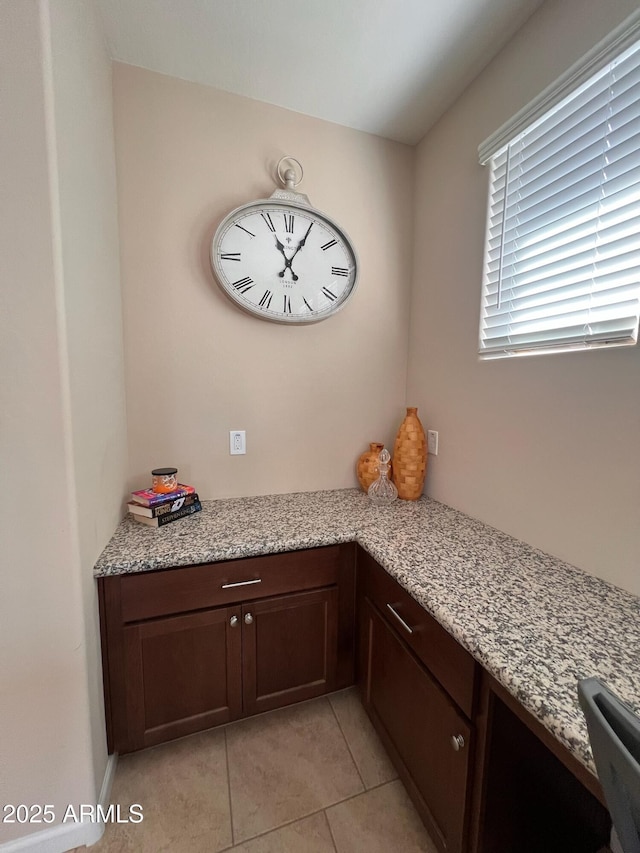 interior space featuring light tile patterned floors