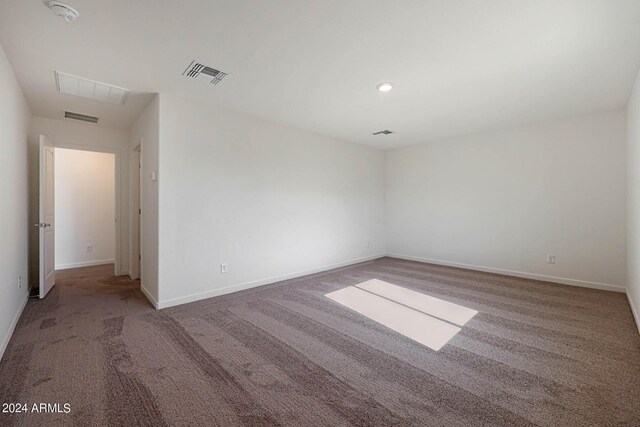 spare room with carpet flooring