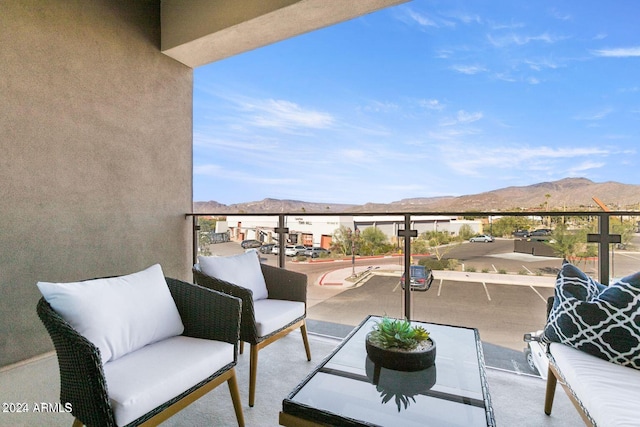 balcony featuring a mountain view