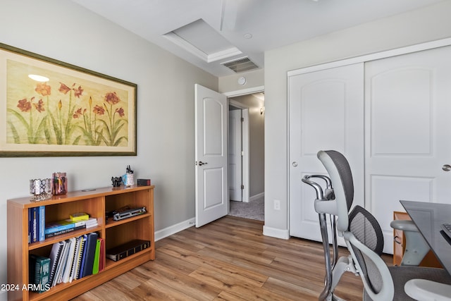 office area with light hardwood / wood-style floors