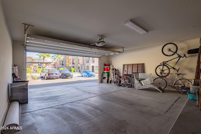 garage featuring a garage door opener