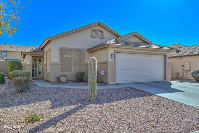 ranch-style home with a garage