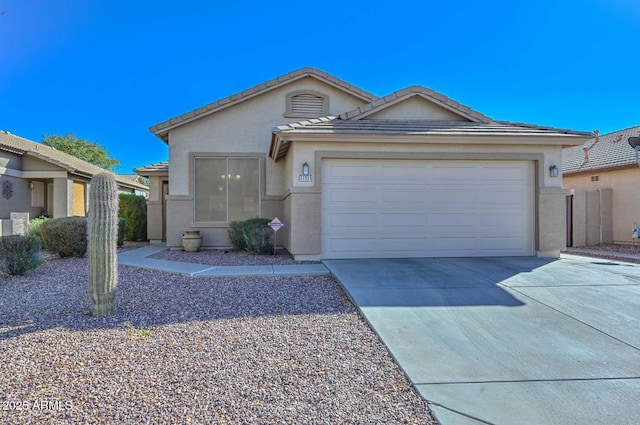 ranch-style home with a garage