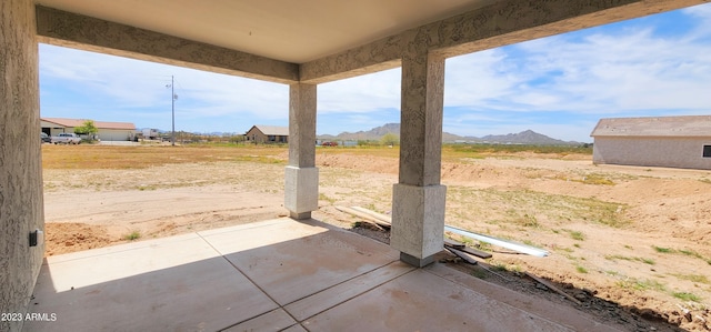 view of patio featuring a mountain view