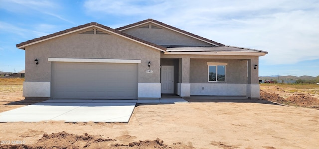 ranch-style house with a garage