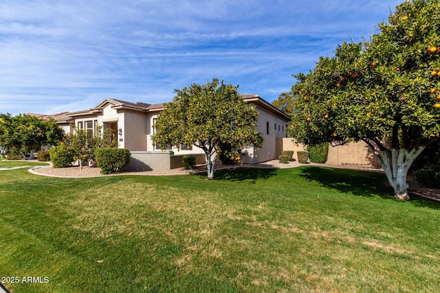 view of front of home featuring a front lawn