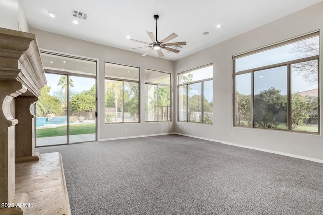 interior space featuring ceiling fan