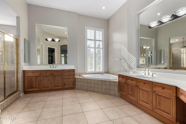 bathroom featuring tile patterned flooring, vanity, and independent shower and bath