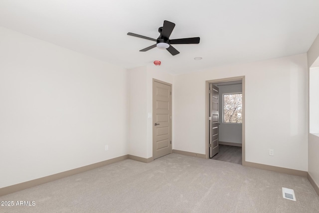 48451 N 27th Ave, New River, AZ 85087 - unfurnished bedroom with light carpet and baseboards