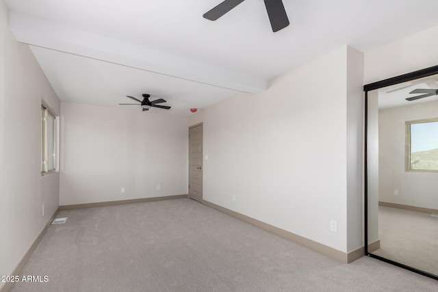 48451 N 27th Ave, New River, AZ 85087 - unfurnished room with ceiling fan, light colored carpet, and baseboards