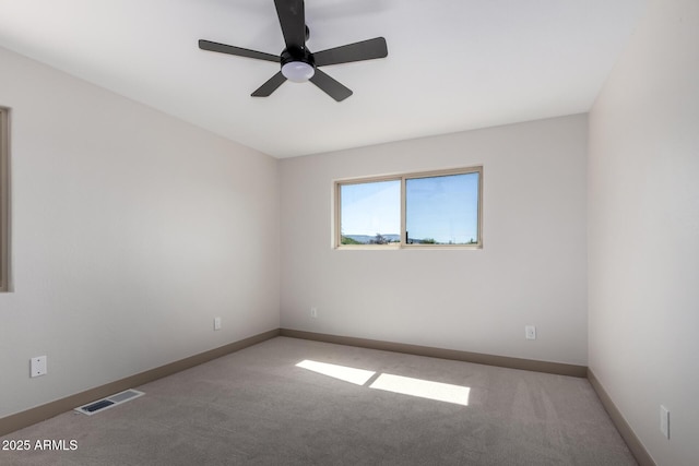 48451 N 27th Ave, New River, AZ 85087 - spare room with carpet, a ceiling fan, and baseboards