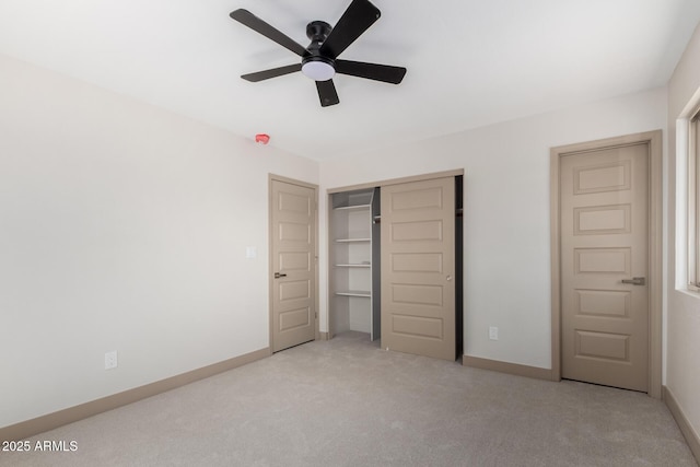 48451 N 27th Ave, New River, AZ 85087 - unfurnished bedroom featuring carpet, a closet, baseboards, and ceiling fan