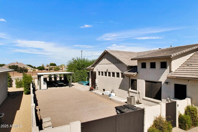 2652 E Pelican Ct, Gilbert, AZ 85297 - view of front of home with stucco siding, a patio area, and a tiled roof