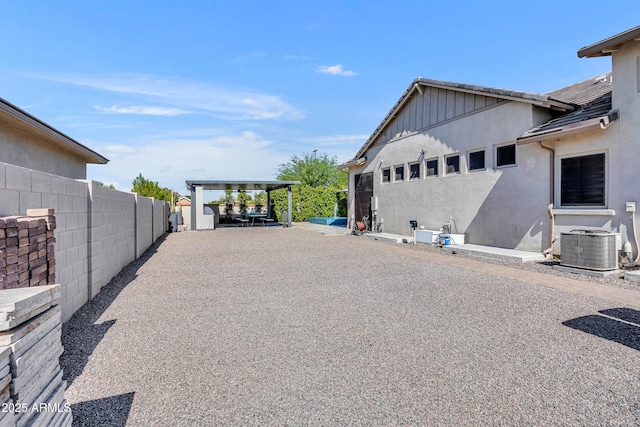 2652 E Pelican Ct, Gilbert, AZ 85297 - view of property exterior featuring stucco siding and board and batten siding