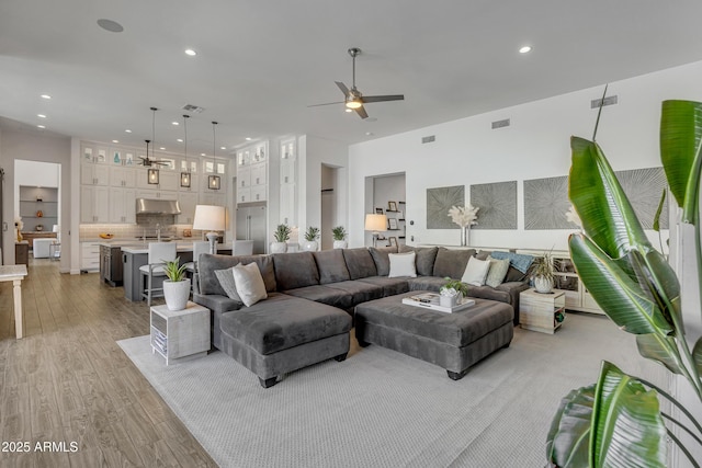 2652 E Pelican Ct, Gilbert, AZ 85297 - living area featuring a ceiling fan, wood finished floors, and recessed lighting