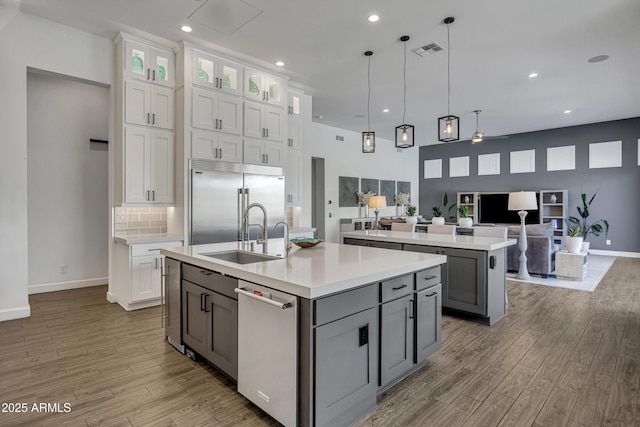 2652 E Pelican Ct, Gilbert, AZ 85297 - kitchen with appliances with stainless steel finishes, an island with sink, light countertops, and recessed lighting