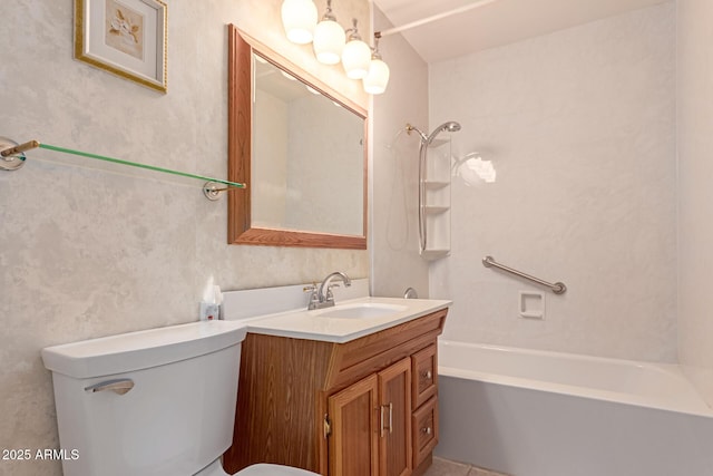 full bathroom featuring vanity, tub / shower combination, and toilet