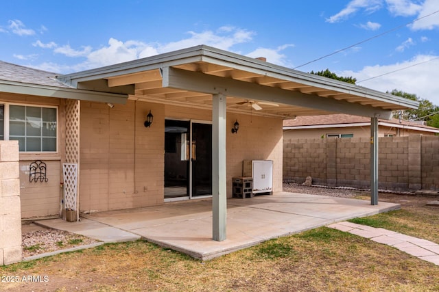 exterior space featuring a patio and ceiling fan