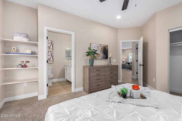 bedroom with access to outside, ceiling fan, and light colored carpet