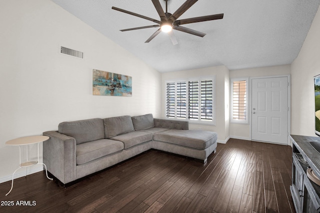 living room featuring dark wood-style floors, baseboards, visible vents, lofted ceiling, and ceiling fan