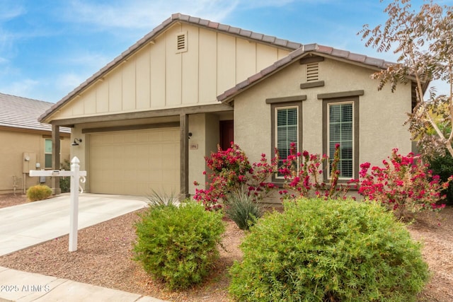 view of front of property with a garage