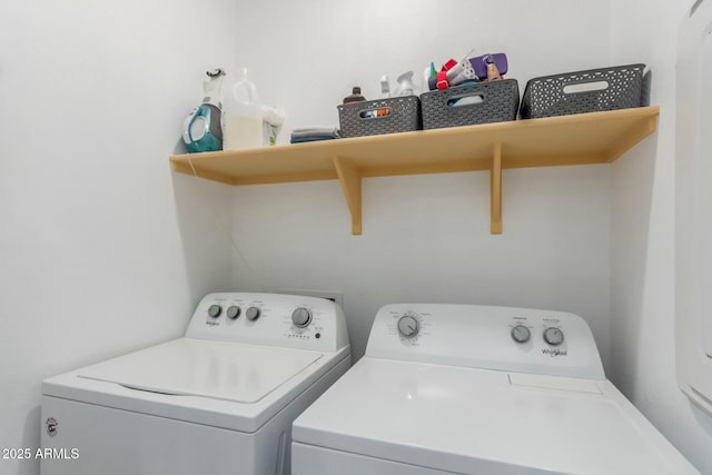 washroom with washing machine and dryer