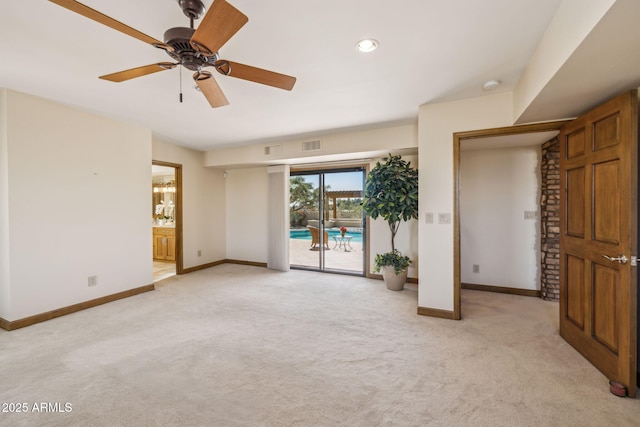 unfurnished room with visible vents, baseboards, a ceiling fan, light colored carpet, and recessed lighting