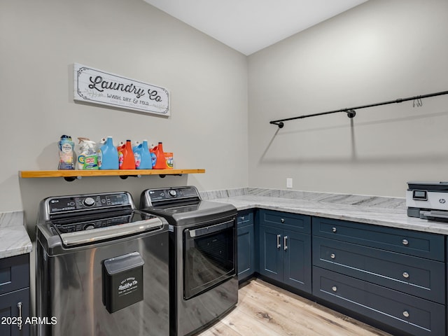 1137 Timbernook Xing, Williams, AZ 86046 - laundry area featuring independent washer and dryer, cabinet space, and light wood-style floors