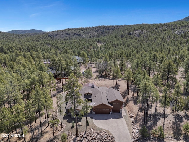 1137 Timbernook Xing, Williams, AZ 86046 - view of subject property featuring a heavily wooded area and mountains