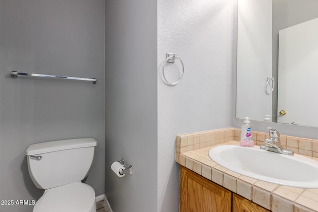 125 S 56th St Unit 124, Mesa, AZ 85206 - bathroom featuring toilet and vanity