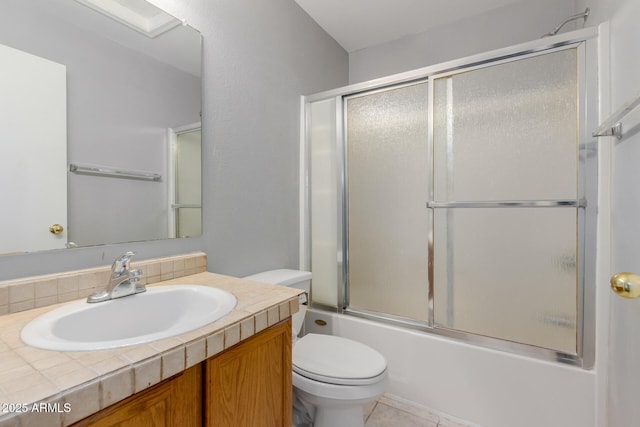125 S 56th St Unit 124, Mesa, AZ 85206 - bathroom featuring toilet, vanity, enclosed tub / shower combo, and tile patterned floors