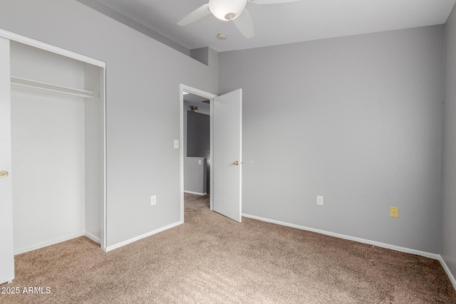 125 S 56th St Unit 124, Mesa, AZ 85206 - unfurnished bedroom featuring light carpet, a closet, baseboards, and a ceiling fan