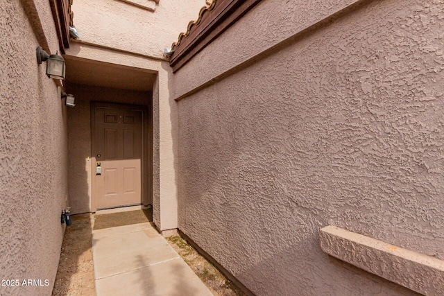 125 S 56th St Unit 124, Mesa, AZ 85206 - view of exterior entry featuring stucco siding