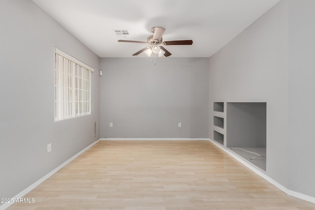 125 S 56th St Unit 124, Mesa, AZ 85206 - unfurnished room featuring ceiling fan, light wood-type flooring, and baseboards