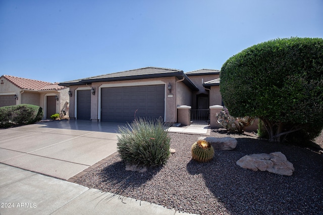 view of front of property featuring a garage